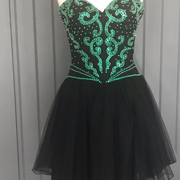Sherri Hill Dresses & Skirts - Sherri Hill black cocktail it’s green stones
